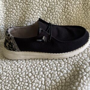 Hey Dude ladies slip on shoes, black w/silver leopard print. Sz 6 great cond